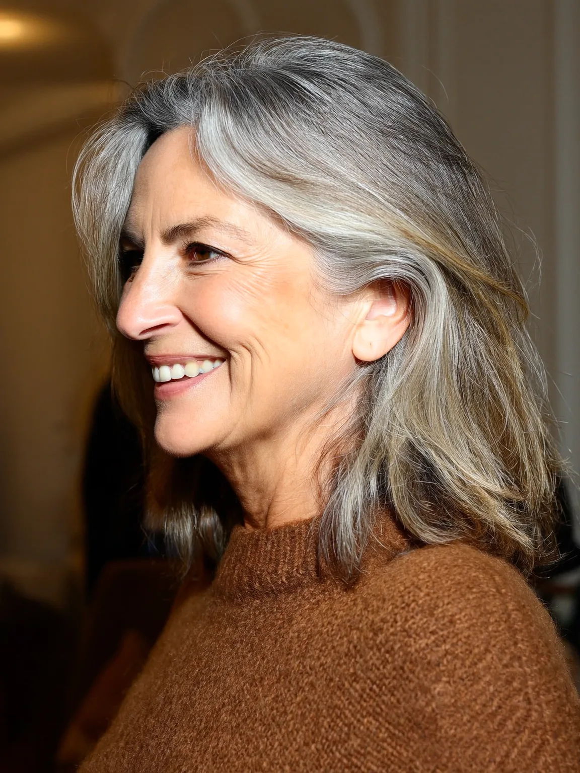Layered Wavy Bob with Side-Swept Bangs and Natural Lowlights